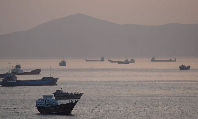 Ship rescue operation in Hormuz Strait during geopolitical tensions.