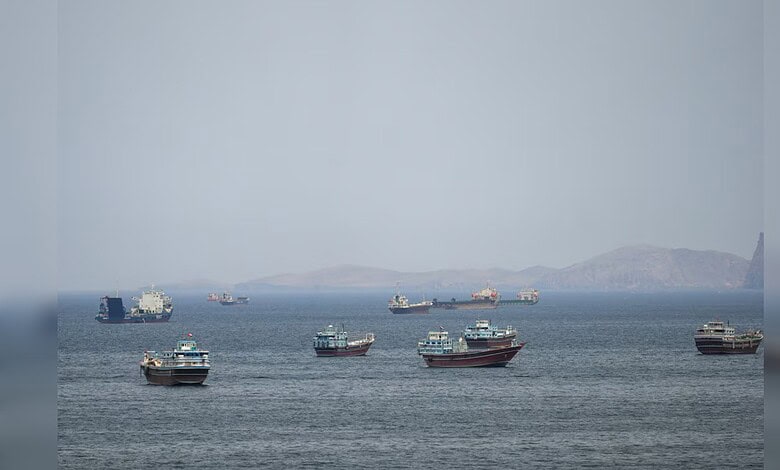 Oil tankers and ships in the Persian Gulf amid maritime tensions and regional conflicts.
