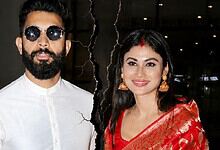 Suraj Nambiar and Mouni Roy at an event, with Suraj Nambiar deleting all pictures with Mouni Roy amid div.