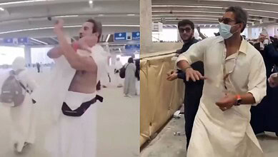 Former Pakistan cricket captain Wasim Akram performs the Rami al-Jamarat ritual in Mina during Haj, using a bowling-style motion while throwing pebbles.