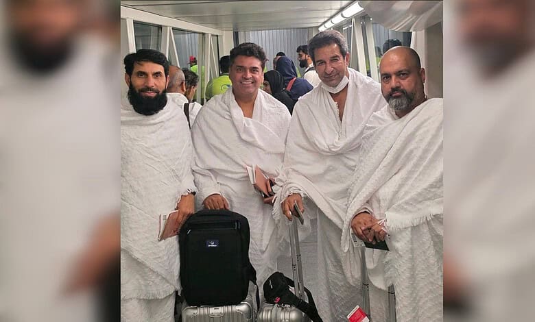 From left, Misbah-ul-Haq, Fakhr-e-Alam, Wasim Akram and Arsalan H Shah pose in white Ihram garments before departing for Haj in Saudi Arabia.