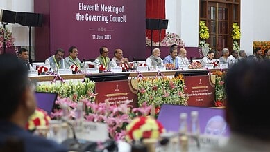 Eleventh Meeting of the Governing Council held on 11 June 2024 with officials seated at a conference tabl.