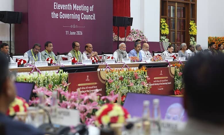 Eleventh Meeting of the Governing Council held on 11 June 2024 with officials seated at a conference tabl.
