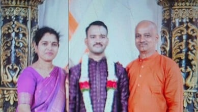 Celebrating a special event with three individuals dressed in traditional attire at a formal gathering.
