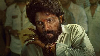 Allu Arjun in a dramatic scene with intense expression and stylish attire.