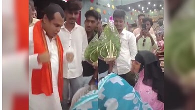 Celebration event at The Siasat Daily with people exchanging gifts and enjoying festivities.