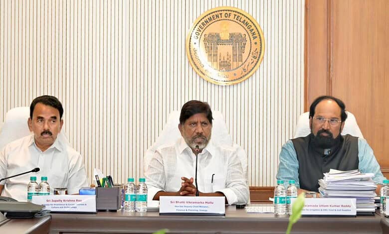 Telangana government officials at a meeting discussing tourism and revenue growth.