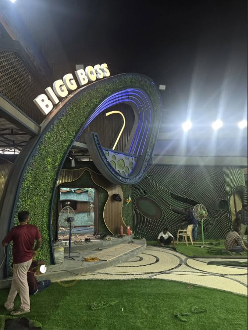 The Bigg Boss themed entrance with vibrant green and blue design elements at The Siasat Daily event.