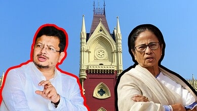 Calcutta High Court building with two women in front, one gesturing, in front of a clear blue sky.