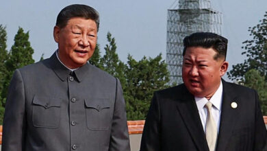 China's President XI Jinping (left), and North Korea's leader Kim Jong Un