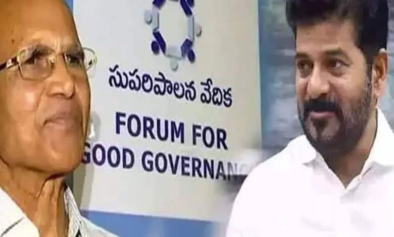 Two men engaged in conversation at the Forum for Good Governance event, highlighting political and civic.