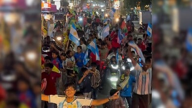 Crowd of football fans celebrating on the streets during FIFA World Cup in Sainikpuri.