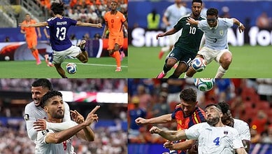Soccer players competing fiercely during a match at FIFA World Cup.