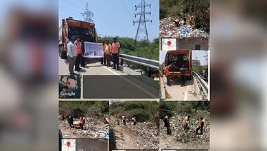 GHMC workers collect waste during monsoon sanitation drive on roadside.