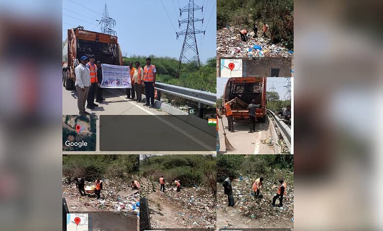GHMC workers collect waste during monsoon sanitation drive on roadside.