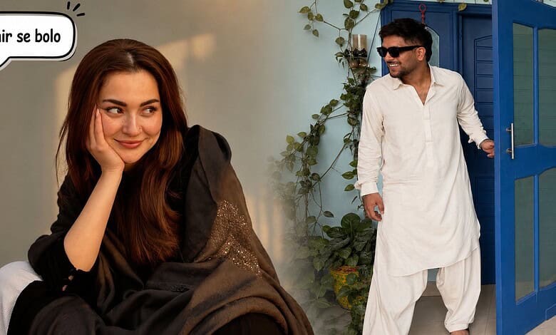 Woman smiling thoughtfully at sunset with a man in traditional white attire near a blue door.