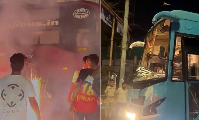 Bus fire emergency in India with flames and smoke, rescue efforts ongoing at night.