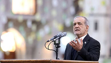 Iran’s Pezeshkian speaking at a press conference in Islamabad during diplomatic talks.