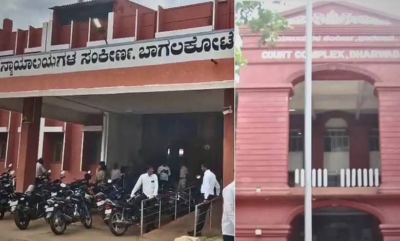 Karnataka court building with people and motorcycles outside during daytime.
