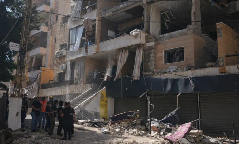 Lebanese security officers gather at the site where an Israeli airstrike hit a building in Dahiyeh, Beirut’s southern suburb, Lebanon, Sunday, June 7, 2026. (Source AP)
