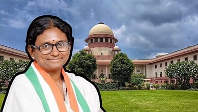 Prominent Indian woman in traditional attire standing in front of the Supreme Court of India.