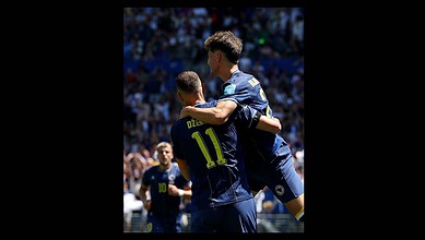 Bosnian players celebrate the win over Qatar