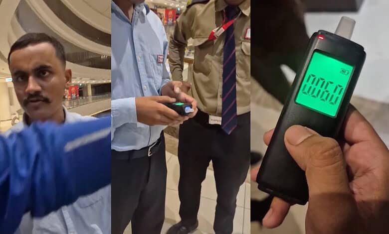 Man at PVR cinema undergoes alcohol test with a breathalyser device in Hyderabad.