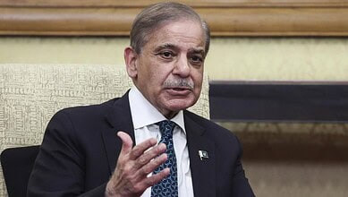Pakistani Prime Minister addressing an audience during a formal event.