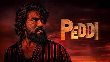 Peddi movie poster featuring a rugged man with a beard and curly hair against a fiery sunset sky, highlig.