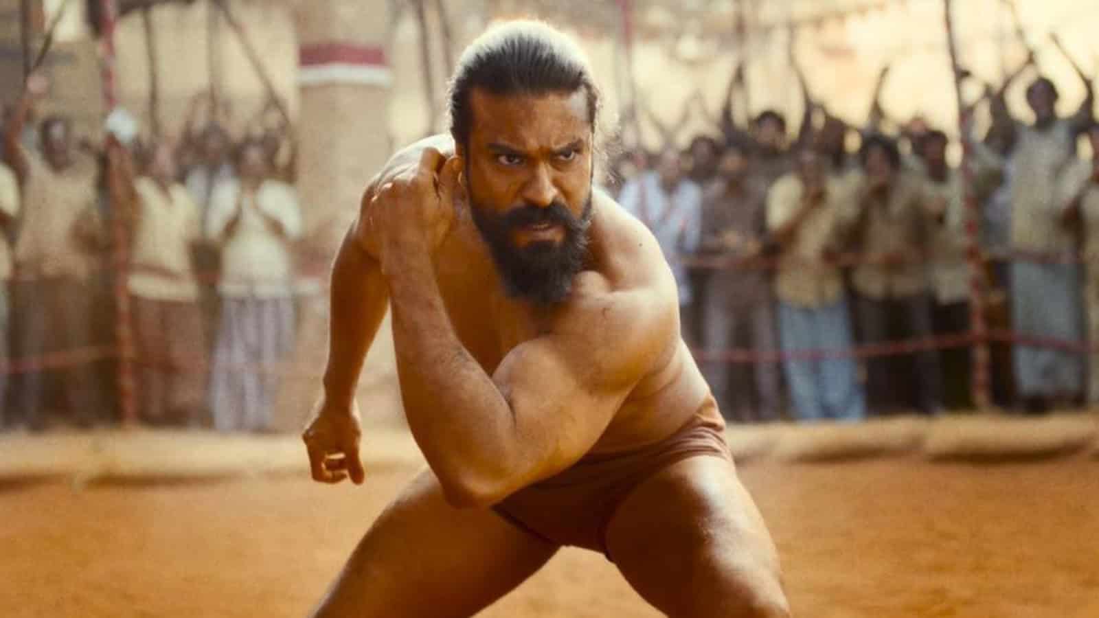 A man with a beard and long hair, dressed in traditional Indian attire, running in a historical or cultur.
