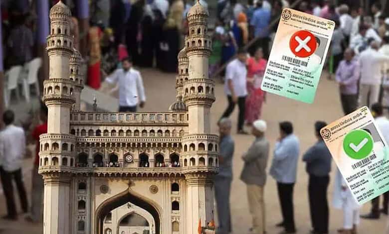 Crowd of people at Hyderabad ticket counter with vaccination certificates in the background.