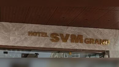 Hotel SVM Grand sign on building facade in en_GB.