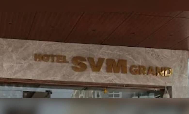 Hotel SVM Grand sign on building facade in en_GB.
