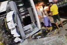 A bus overturns after an accident in Mancherial
