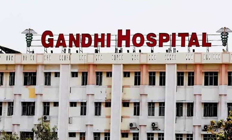 Gandhi Hospital building with prominent red signage in Hyderabad, India, serving as a major healthcare fa.