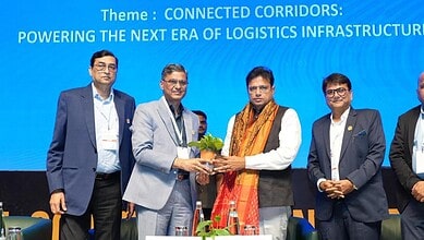 The Siasat Daily: Business leaders at logistics infrastructure event, exchanging awards and networking.