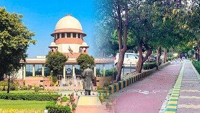 Footpath and park view near Supreme Court with trees and greenery in India.