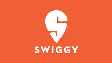 Swiggy logo on orange background, representing food delivery service in India.