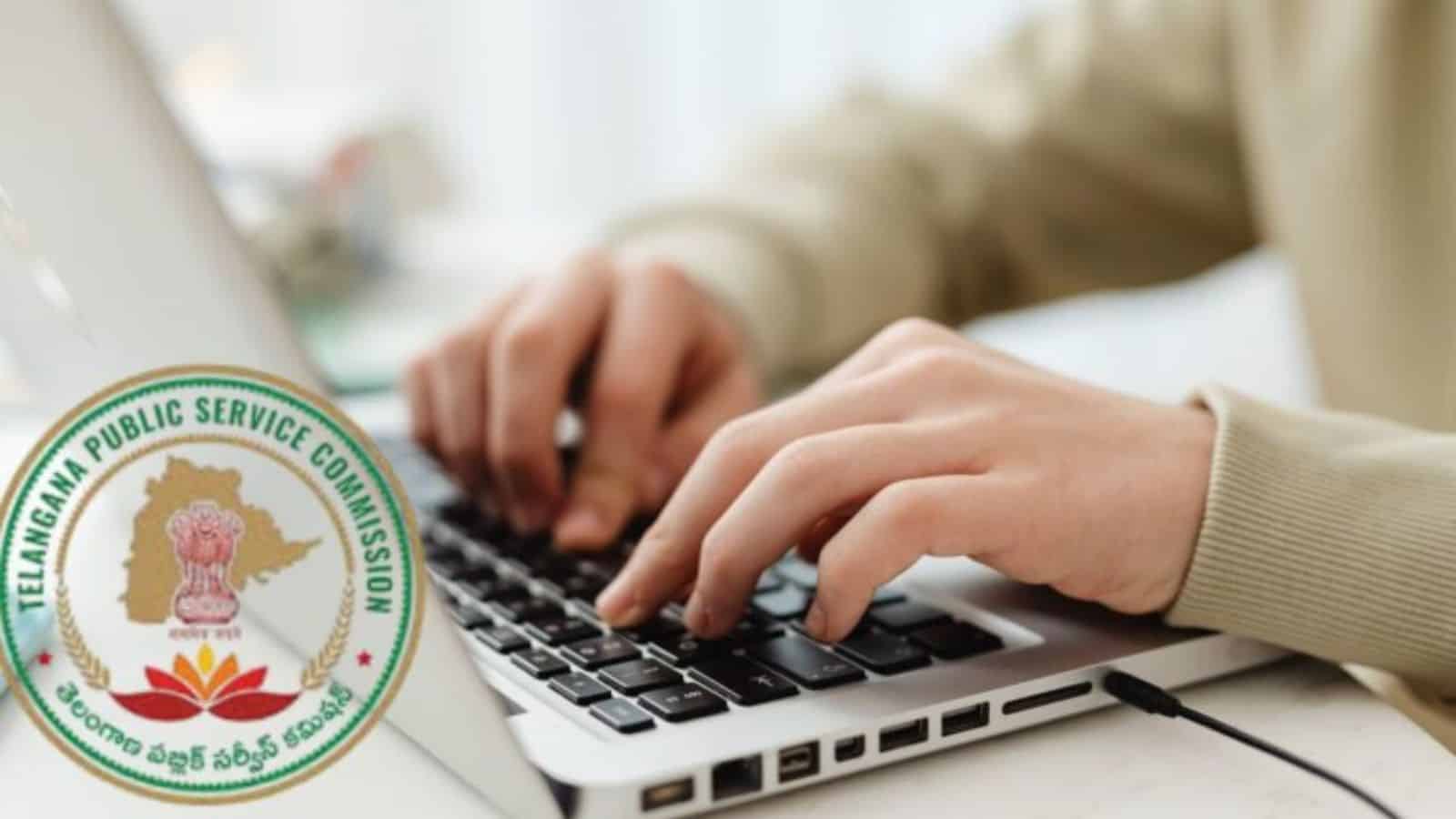 Close-up of hands typing on a laptop with Telangana Public Service Commission logo in the background.