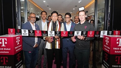Innovative technology event at The Siasat Daily office with executives and staff celebrating digital solu.