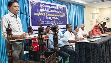 The image shows former Telangana Education Commission Chairman Akunuri Murali speaking at a meeting on public school education held at Sundaraiah Vignana Kendram on Saturday, June 6, 2026.