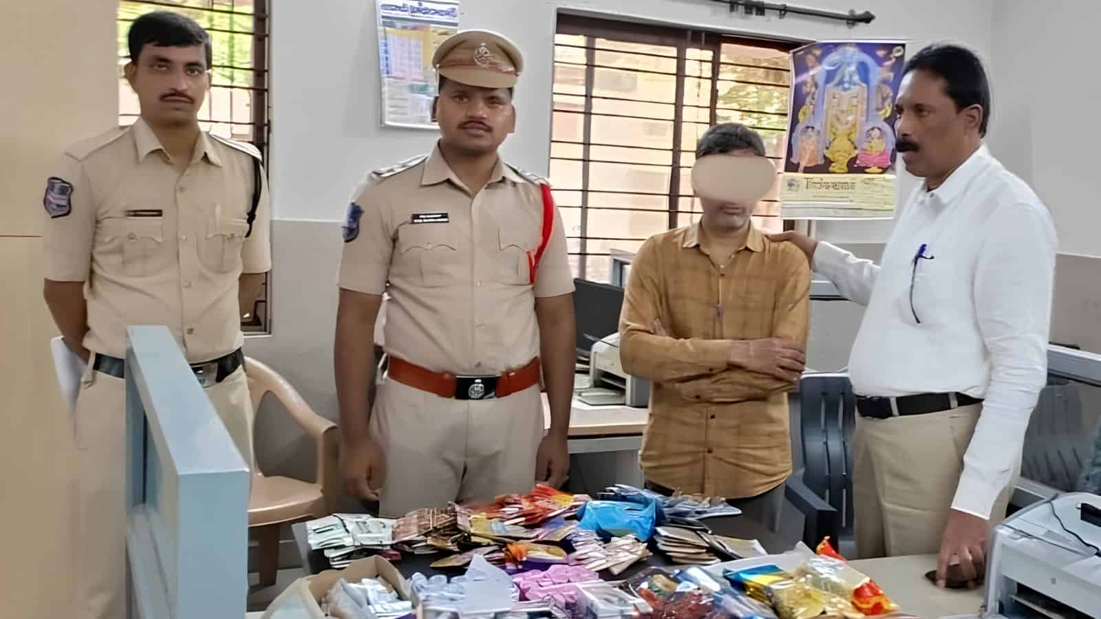 Suspicious individuals and police officers inspecting seized counterfeit goods in an office setting.