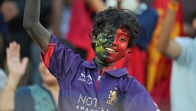 An RCB fan during the IPL Final at Narendra Modi Stadium
