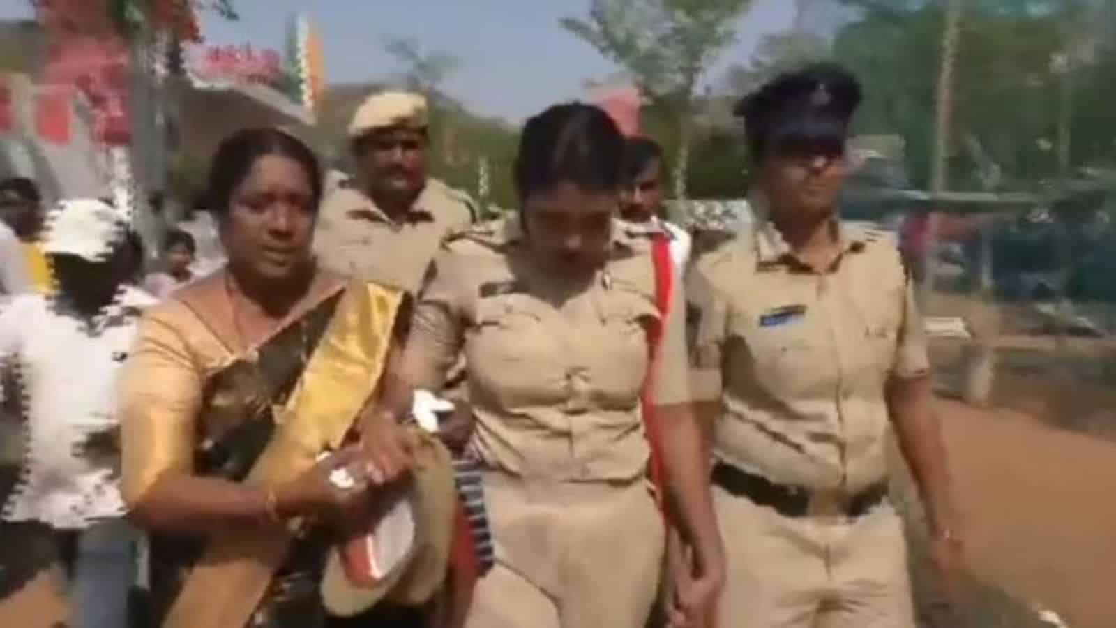 Sub Inspector Amreen is helped by colleagues after collapsing
