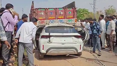 People gather at the accident site