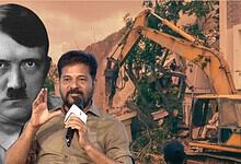 A man speaking into a microphone in front of a construction site with a large image of a historical figur.