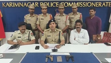 Arrested police officers with seized weapons at Karimnagar Police Commissioner's office, Telangana.