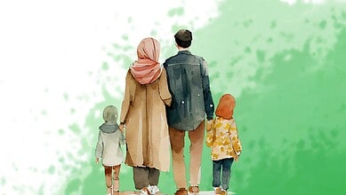A man and woman walking with two children in a park, viewed from behind.