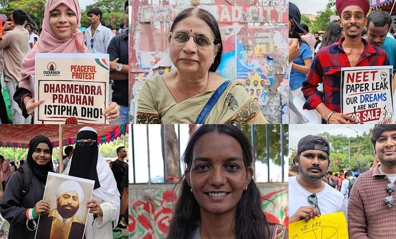 A woman protesting peacefully at a rally with a sign about Dharmendra Pradhan.