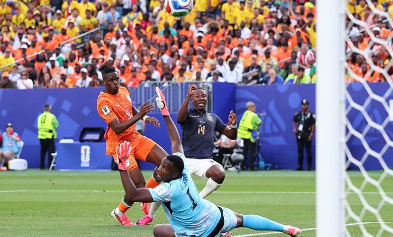 Ivory Coast's Dialo scores a goal against Ecuador